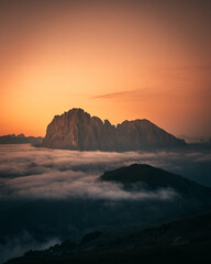 Mountains under sunset light, as seen from Cinque Torri, Dolomite Alps, Italy in summer