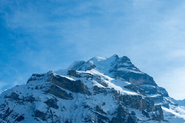 View from Muerren, a village in Switzerland, to the mountains Eiger and Moench