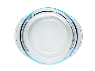 Round-shaped glass casserole with handles. Isolated on a white background, close-up view from above