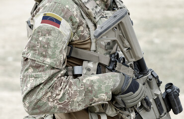 Soldier with assault rifle and flag of Venezuela on military uniform. Collage.