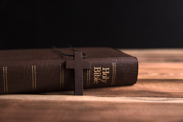 wooden cross with Holy Bible