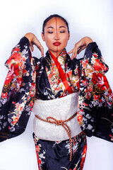 Fototapeta premium young pretty geisha in black kimono with sakura, asian ethno closeup on white background isolated