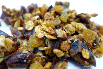 Tasty granola on white with blur effect.
