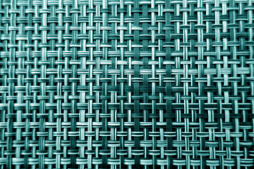 Pattern of plastic tablecloth with blur effect in cyan tone.