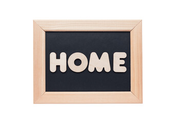 Word HOME made from wooden letters. The concept of the importance of being home. Wooden frame on white background