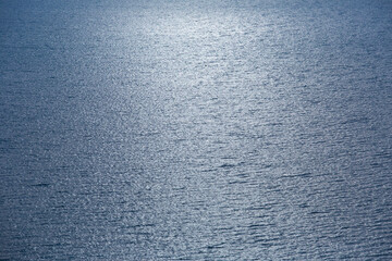 Fototapeta na wymiar Blue tropical sea surface with waves and ripples
