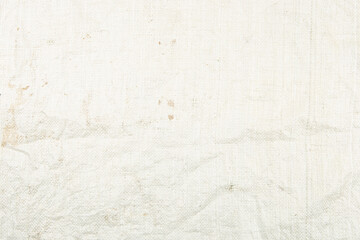 Dirty white woven plastic bag texture background.  Polypropylene sack cloth surface.