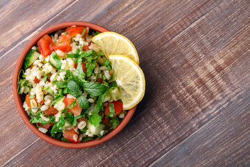 Tabbouleh or Tabouleh salad with bulgur, eastern appetizer 