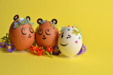 Three Easter eggs with funny faces. Spring. Easter.