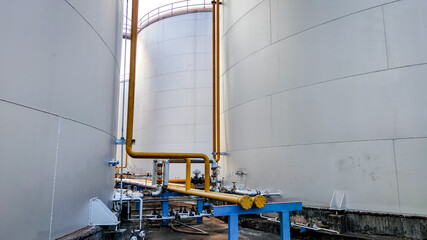 Fuel storage tank oil. Large white industrial for tank oil. Crude oil export factory industry And storage tank . industrial pipes 