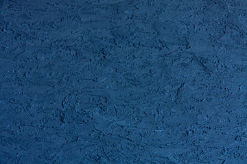 Fototapeta na wymiar dark blue rough surface background