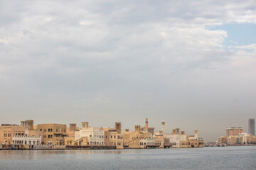 Fototapeta premium buildings of Old Dubai at sunrise
