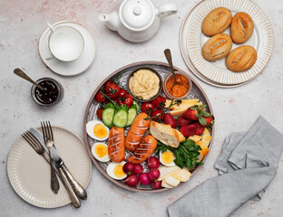 Breakfast or brunch tray with various food for the whole family