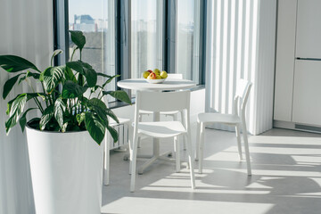 beautiful kitchen in the office with large panoramic windows and city views