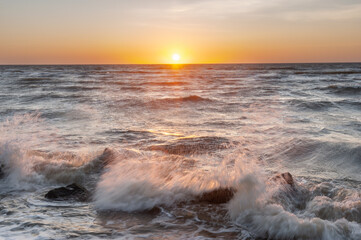 Obraz na płótnie Canvas Summer landscape with sunrise over sea