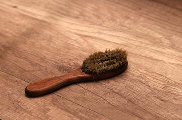 wooden brush on a brown table