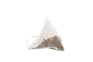 Dried tea leaves in a bag on the table.