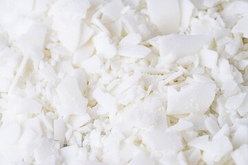 Full frame of white soy wax flakes for candle making
