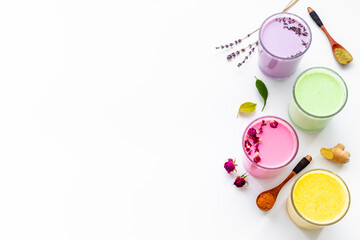 Colorful latte coffee or tea - with blue spirulina turmeric and matcha