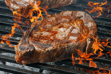 barbeque steak on a black slate board