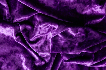 Fabric is velvet in purple colored. The texture of the velour fabric is purple.