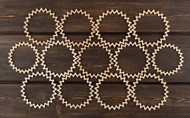 background of carved wooden circles. beautiful vintage wood patterns. laser wood carving. round wooden frame