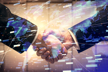 Double exposure of data theme hologram and handshake of two men. Partnership in IT industry concept.