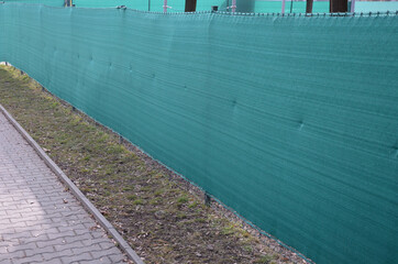the shading fabric on the wire fence creates a private space and in a moment you have an opaque...
