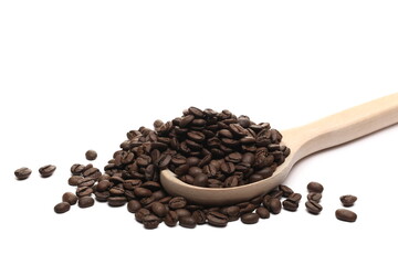 Coffee beans pile with wooden spoon isolated on white background