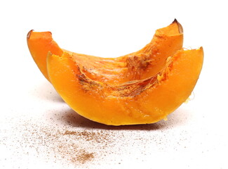  Roasted muscat squash slices with sprinkled cinnamon powder isolated on white background