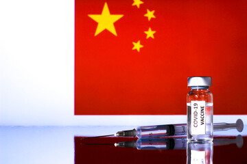  Vial with covid vaccine and syringe