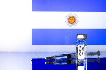  Vial with covid vaccine and syringe