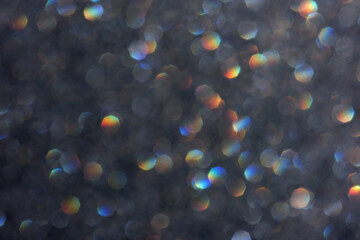 Bokeh background. Glowing circles on defocused light abstract background.	