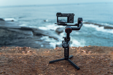 Camera with gimbal for film shooting - obrazy, fototapety, plakaty