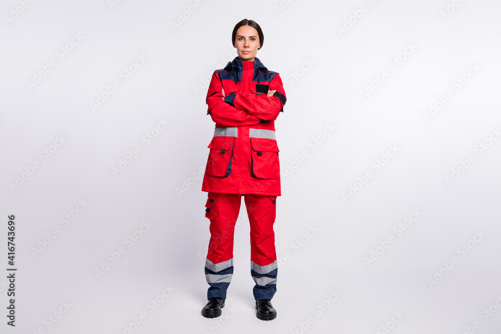 Sticker Full body photo of young serious woman crossed hands wear uniform paramedic doctor help isolated over white color background