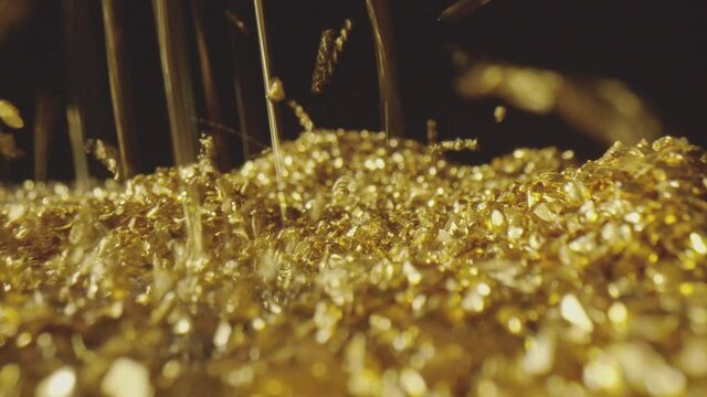 Rain of gold nuggets with dolly movement