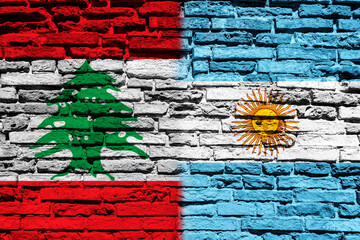 Flag of Lebanon and Argentina on brick wall