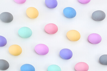 
Easter composition, colorful Easter eggs on a white surface