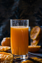 orange juice in a glass on the table