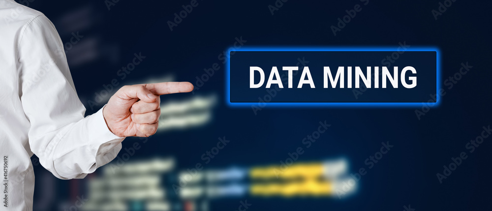 Poster male hand points to the word data mining with technology background. cryptocurrency data mining