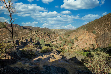 Rock formations in Pinnacles National Park in California, the destroyed remains of an extinct volcano on the San Andreas Fault. Beautiful landscapes, cozy hiking trails for tourists and travelers.