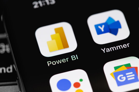 Power BI Mobile App Icon On Screen Smartphone, IPhone. Power BI Is Microsoft's Comprehensive Business Intelligence Software. Moscow, Russia - February 16, 2021