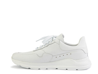 White classic leather trainers. Breathable, comfortable leather. Casual women's style. White lacing and white rubber soles. Isolated close-up on white background. Left side view. Fashion shoes.