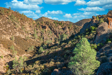 Rock formations in Pinnacles National Park in California, the destroyed remains of an extinct volcano on the San Andreas Fault. Beautiful landscapes, cozy hiking trails for tourists and travelers.