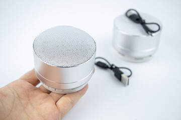 New wireless grey no name mini speakers on white background