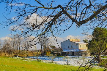 Winter landscape with country house. Marche Region, Italy