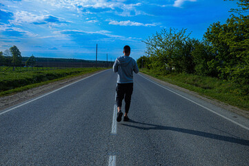 man running on the road