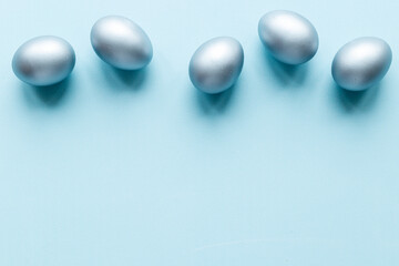 Silver Easter eggs. Easter decoration, top view