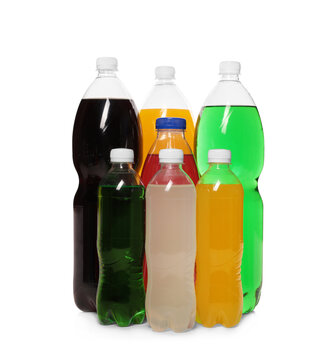 Bottles of soft drinks on white background