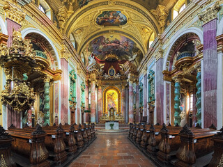 Fototapeta na wymiar Vienna, Austria. Interior of Jesuit Church, also known as University Church. The church was built in 1623-1627. It was remodeled in 1703-1705 by the Italian architect and painter Andrea Pozzo.